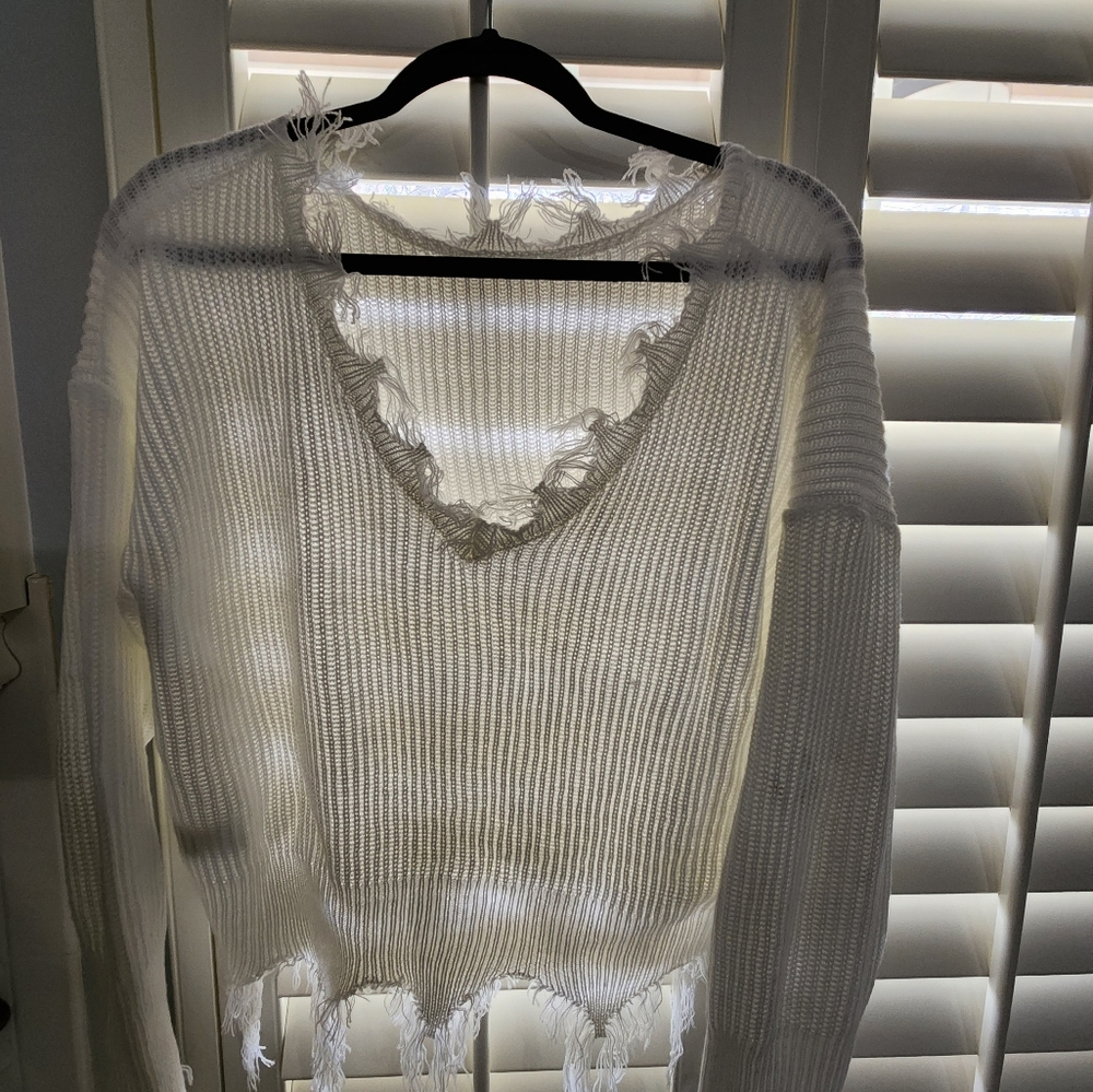 The tattered look sweater